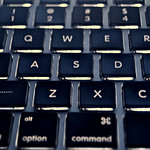 An apple computer keyboard to show digital rhetoric.