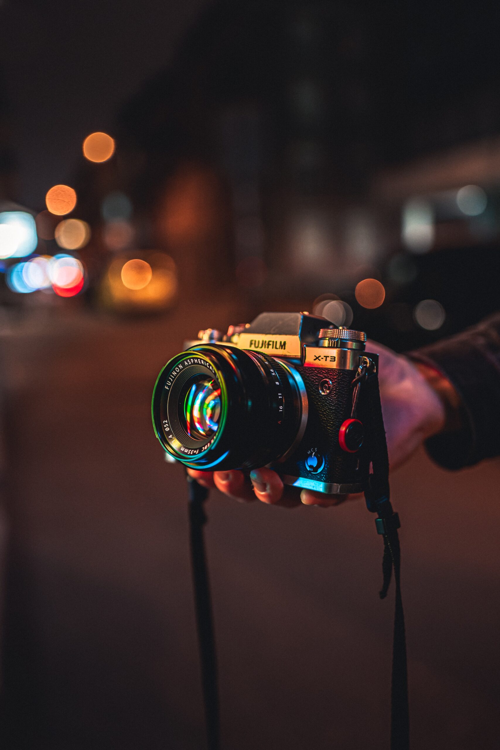 The camera contains visual aspects in its ability to take a photo and the colors reflecting off of it. Visual rhetoric includes methods to study images taken by the camera above.
