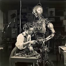 A scientist working on a freaky robot in the 1950s.