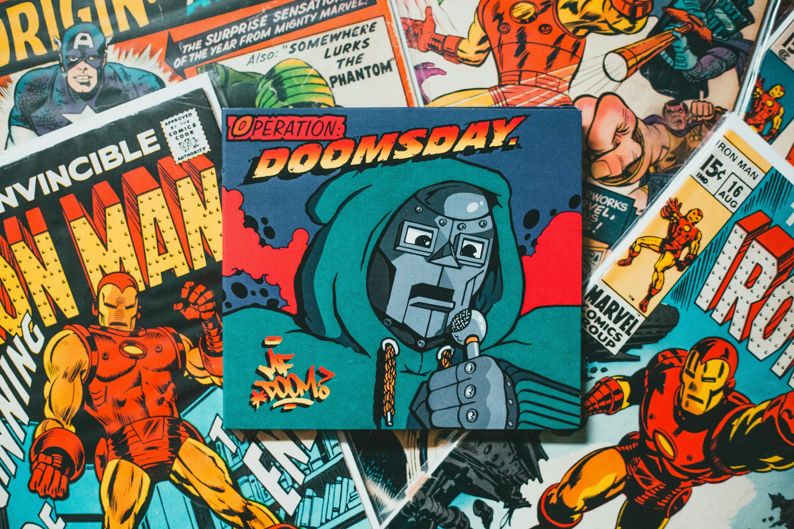 A bunch of Marvel comics laid on top of each other, with Doctor Doom in the center.