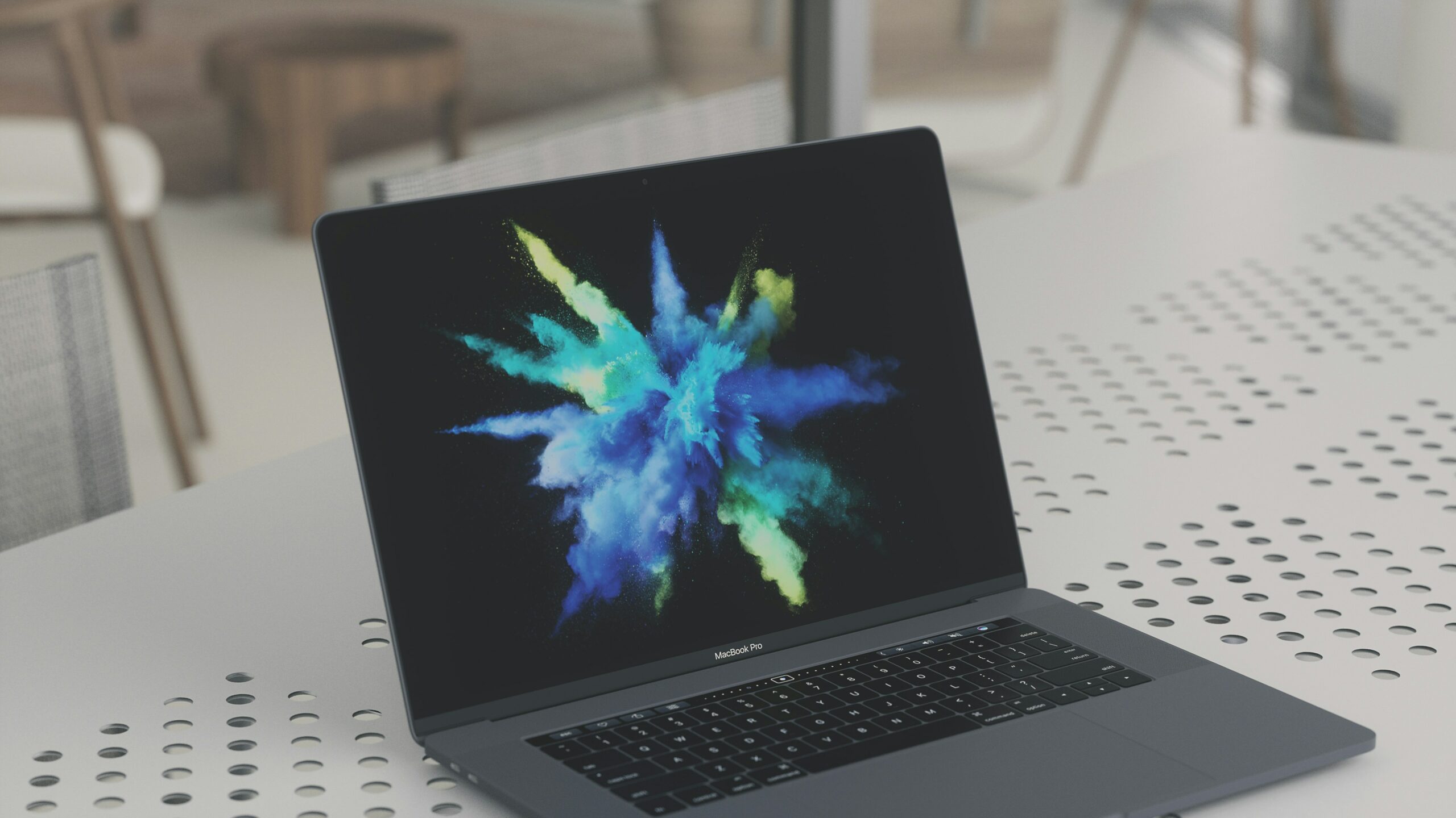 A computer which displays an image of colors.