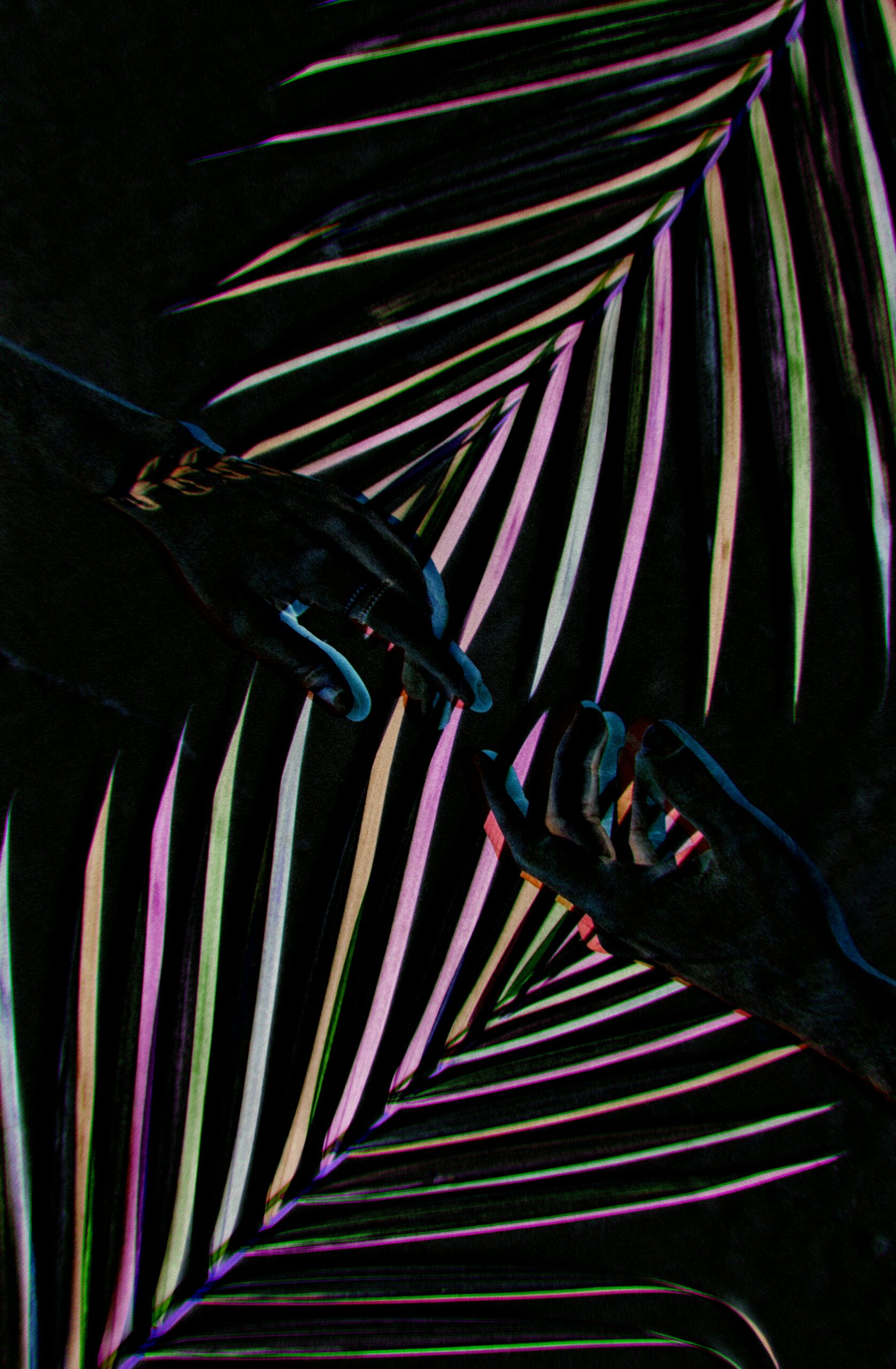two hands touching to create a remix feel to the environment.
